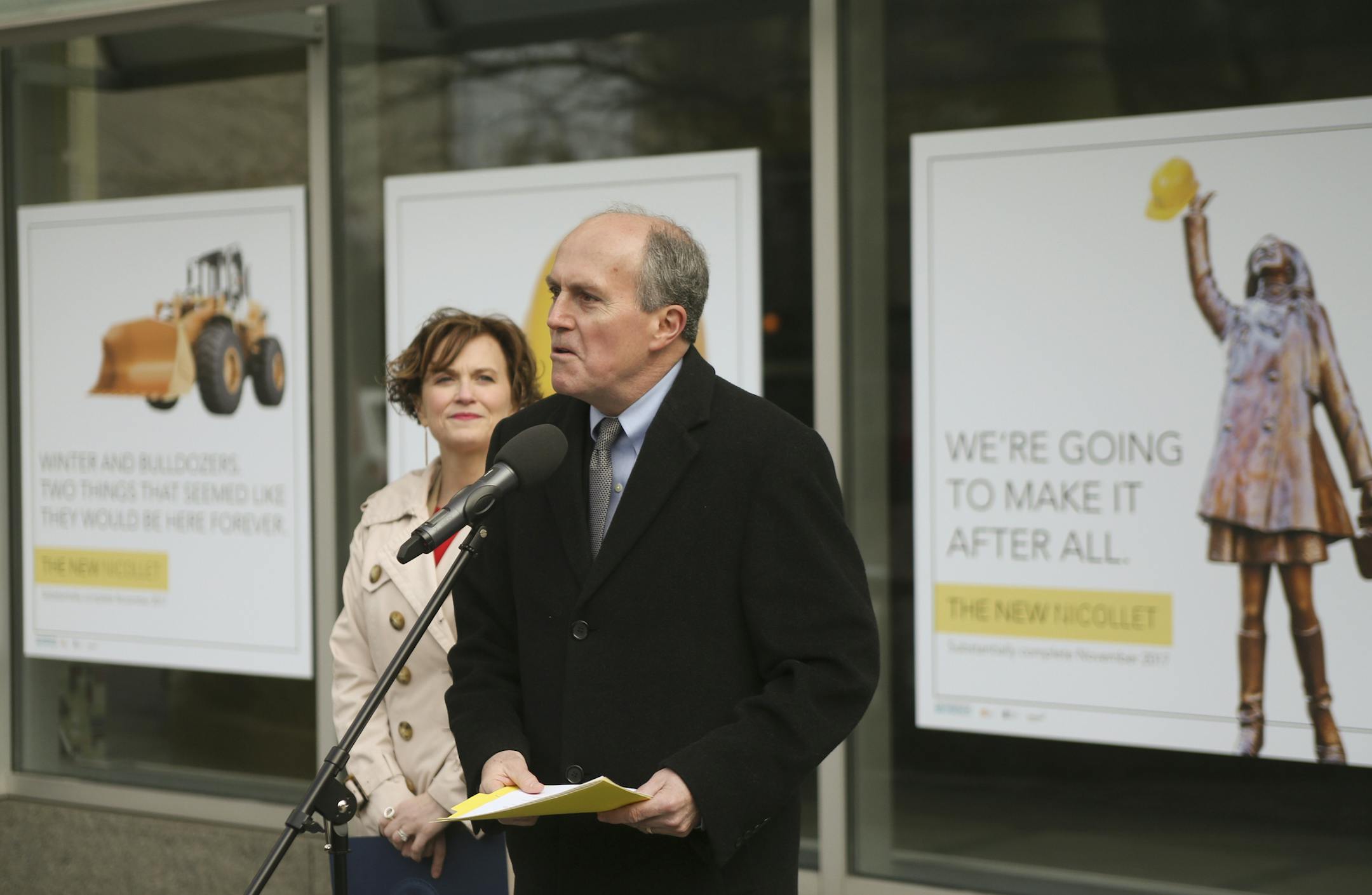 Mayor Betsy Hodges looks on as Steve Cramer, president and CEO of the Minneapolis Downtown Council speaks to the press about the Nicollet Mall reconstruction project and a new creative campaign. ] Minneapolis, Friday, March 31, 2017. Matt Gillmer / matt.gillmer@startribune.com