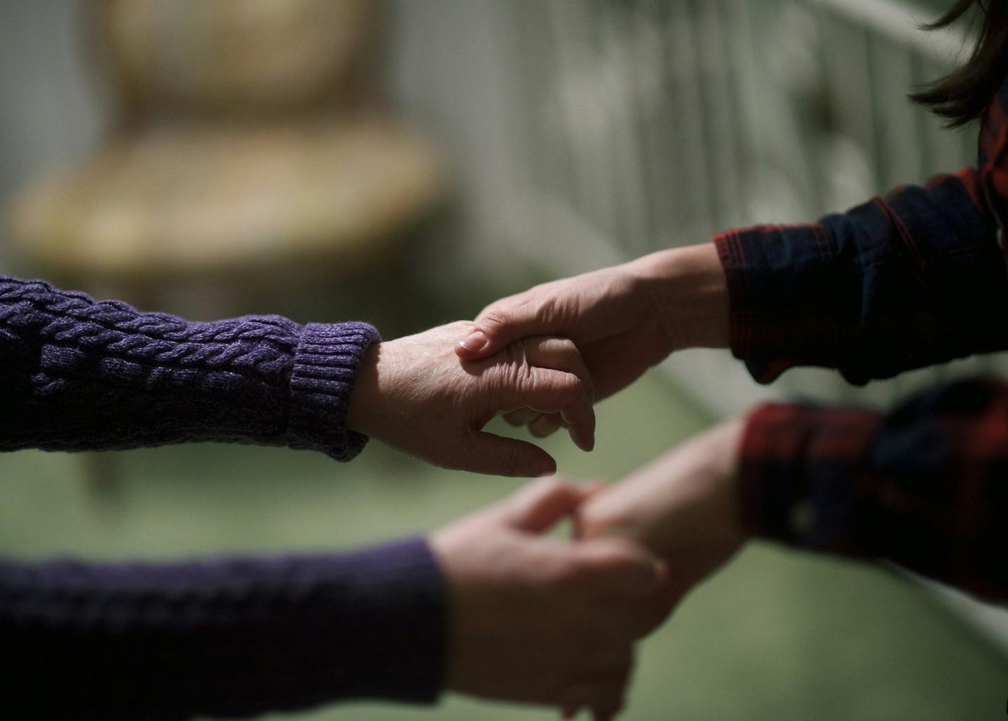 Elizabeth Wolf, right, leads her mother Nancy Brood to bed, at their home in Haddonfield, N.J., Jan 5, 2016. In 2010 Wolf, along with her husband, moved back into her childhood home to help her parents, who both suffer from dementia, expecting to arrange caregiving help and then return home to Vermont: Over five years later, she is still caring for them. (Mark Makela/The New York Times) -- -- NO SALES --