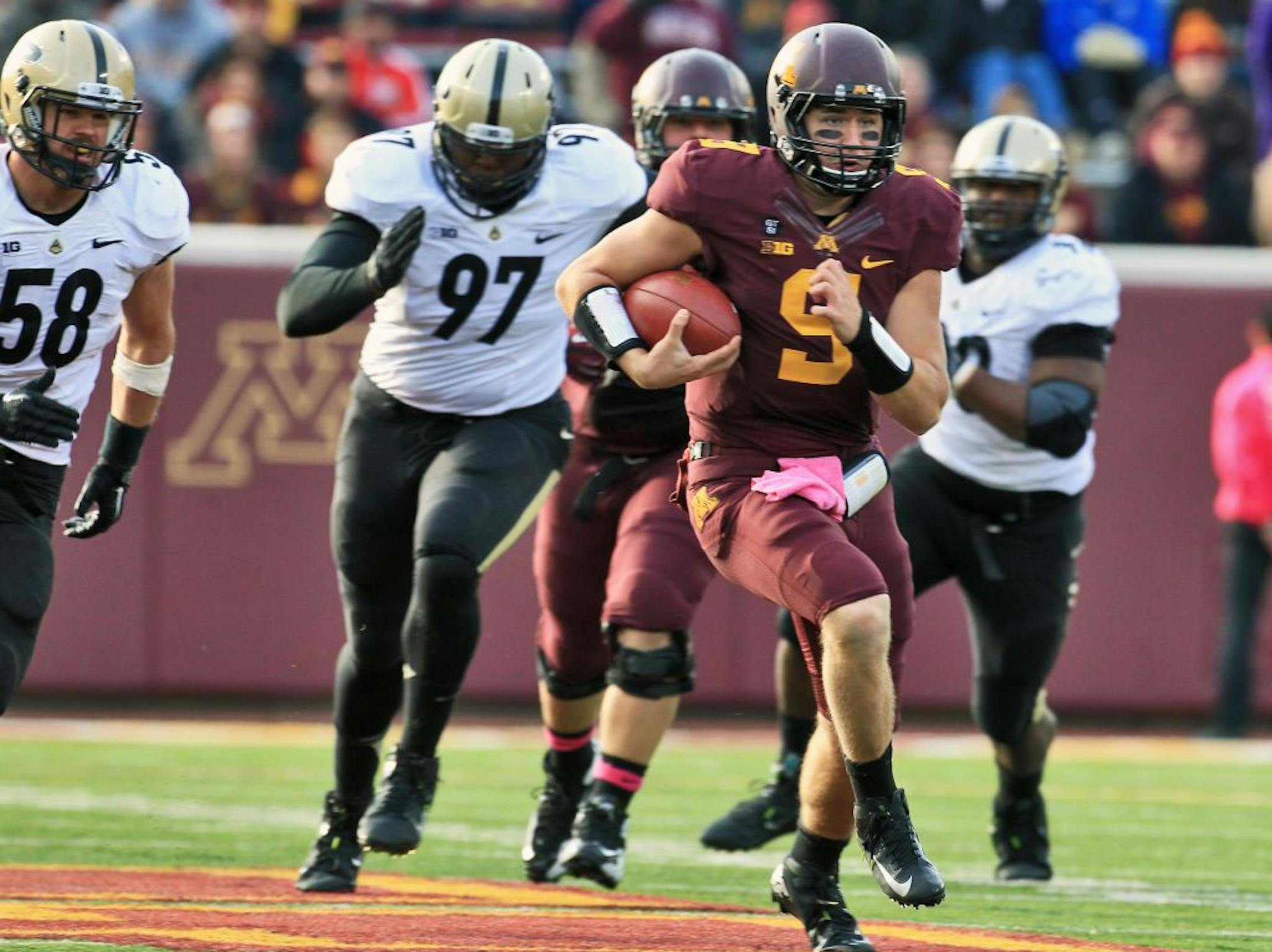 Gophers quarterback Philip Nelson rambled through the Purdue defense to pick up some of his 40 yards rushing in the game.
