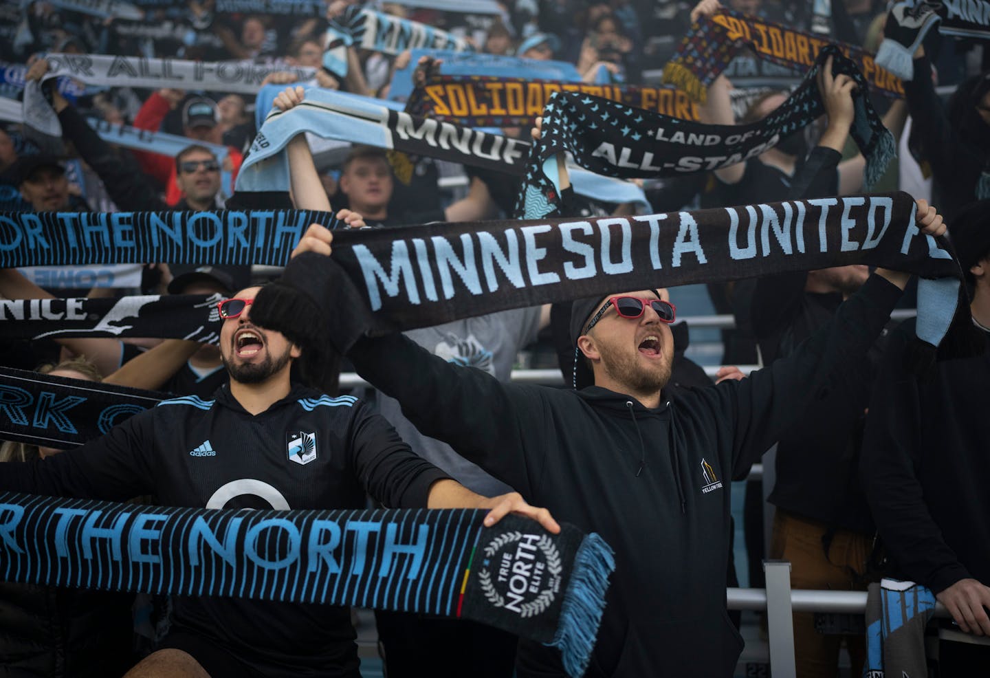 Fans sang at the end of the game after the Loons defeated the Whitecaps Sunday afternoon, October 9, 2022 at Allianz Field in St. Paul. The Minnesota United FC shut out the Vancouver Whitecaps FC 2-0 in a Decision Day game. ] JEFF WHEELER • Jeff.Wheeler@startribune.com