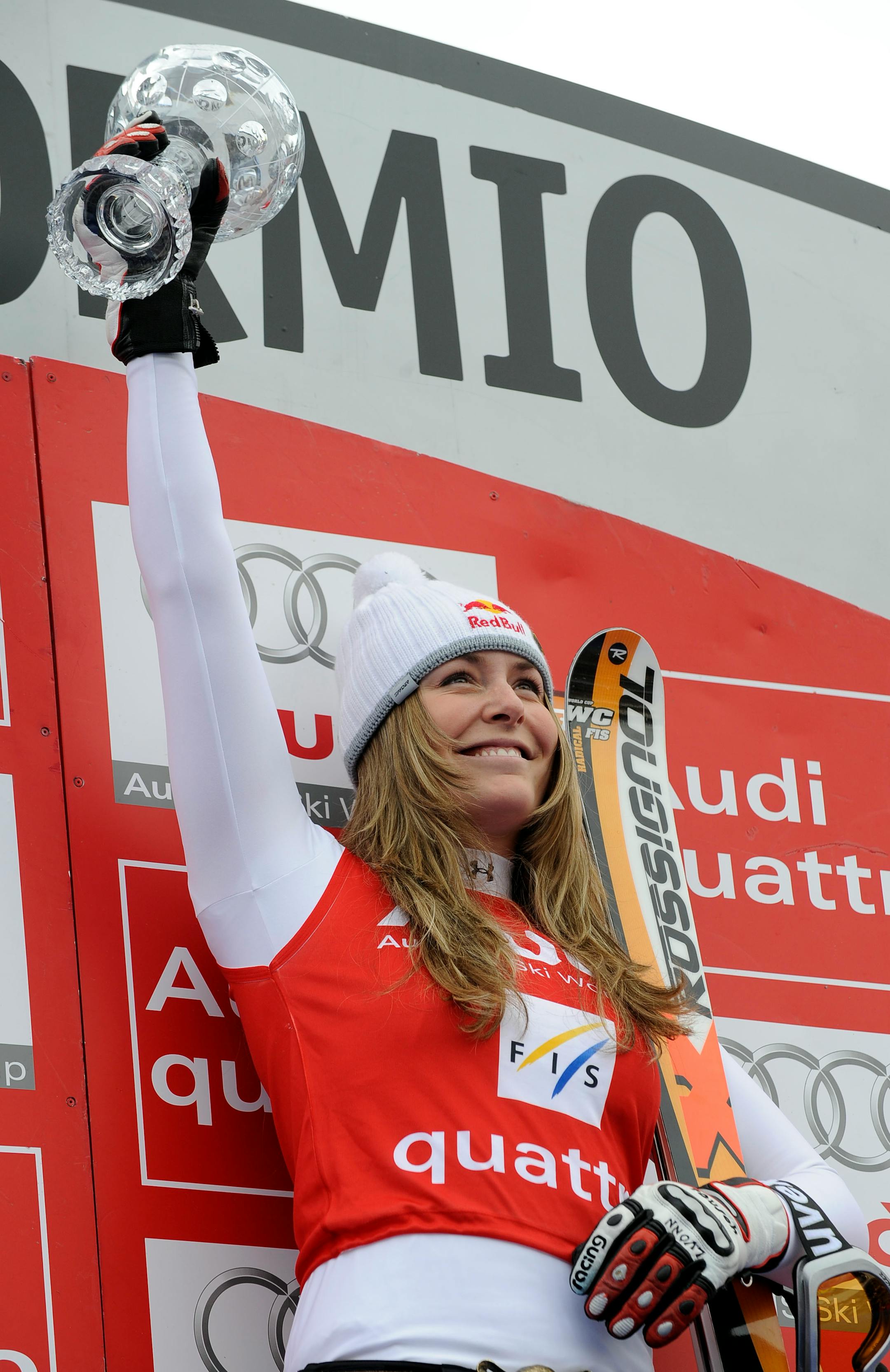 Lindsey Vonn, of the United States, holds up the trophy of the World Cup women's downhill title, at the alpine ski, World Cup finals, in Bormio, Italy, Wednesday, March 12, 2008. The final women's World Cup downhill of the season was canceled Wednesday because of soft snow on the Stelvio course.