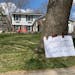 Criminal justice advocates protested outside the Maple Grove home of Sen. Warren Limmer, chairman of Senate Judiciary Committee, on Saturday, April 25