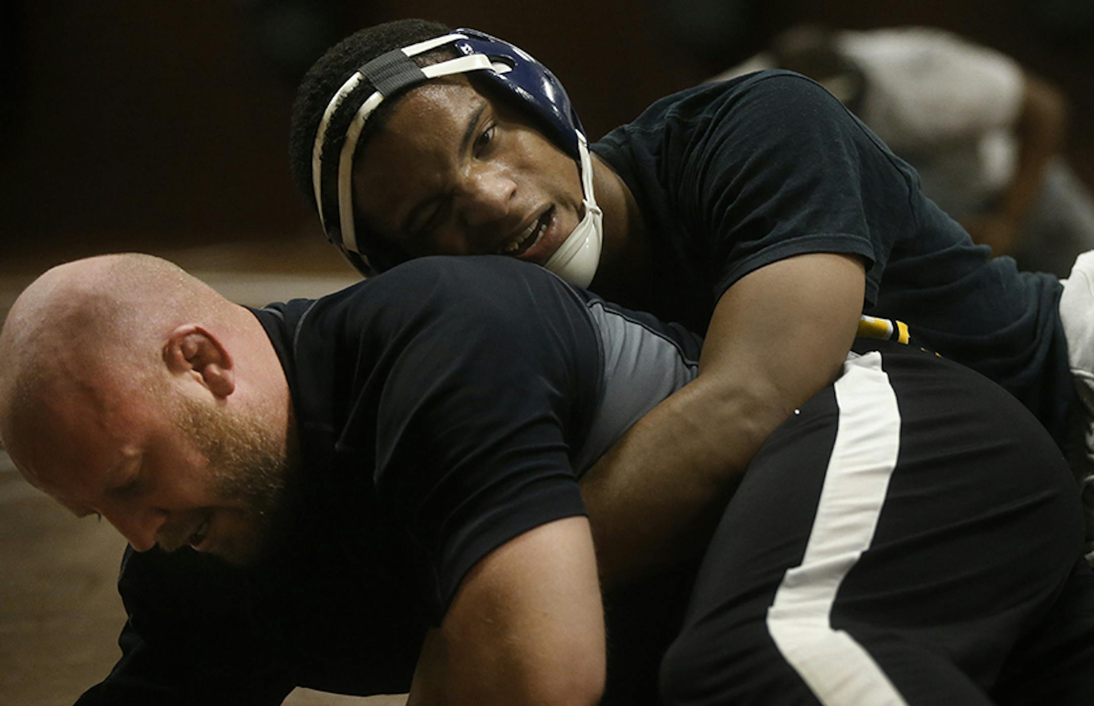 Apple Valley's Mark Hall is considered, pound-for-pound, the best high school wrestler in the nation. The junior wrestles at the 170 lbs. weight class. He is wrestling assistant coach Jake Avre.] Richard Tsong-Taatarii/rtsong-taatarii@startribune.com