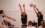 Osseo's Kirby Schmalz and Luke Nelson, right, defended an attack by Lakeville South's Calvin Hertel during a match last year. This year, Andover (7-0)