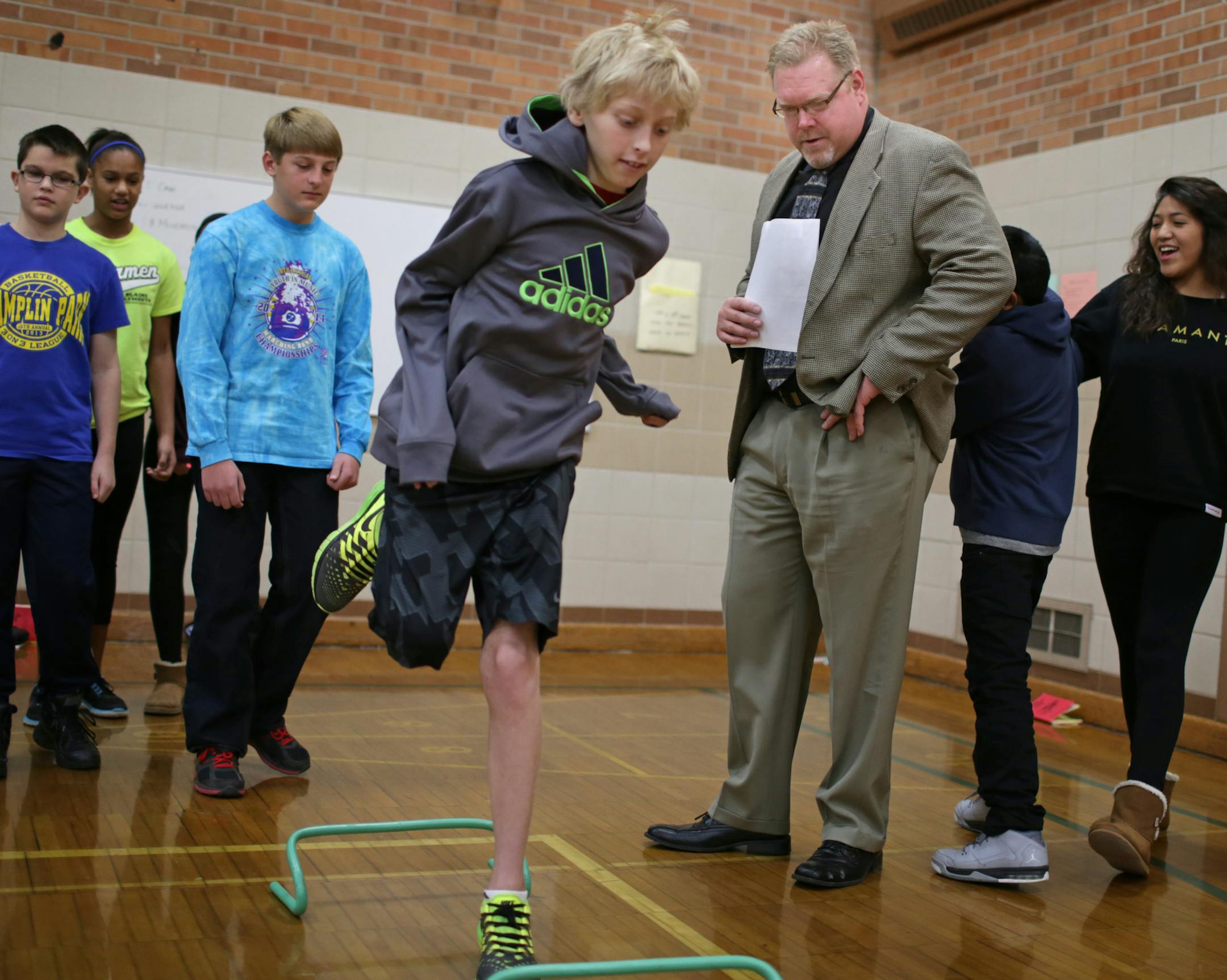 New Anoka-Hennepin Superintendent David Law watches Cole Lindfors, 12, participating in "velocity sports" during a visit to Jackson Middle School Wednesday. ] New Anoka-Hennepin Superintendent David Law visited Jackson Middle School in Champlain to see the various activities for " Get Movin' Day" , an event featuring presentations in "Coming to America", Fur Trading Life", "Migrating Animals", "Get your body movie' ", and "Westward Ho! ". Photo: David Denney &#x201a;&#xc4;&#xa2; ddenney@startrib