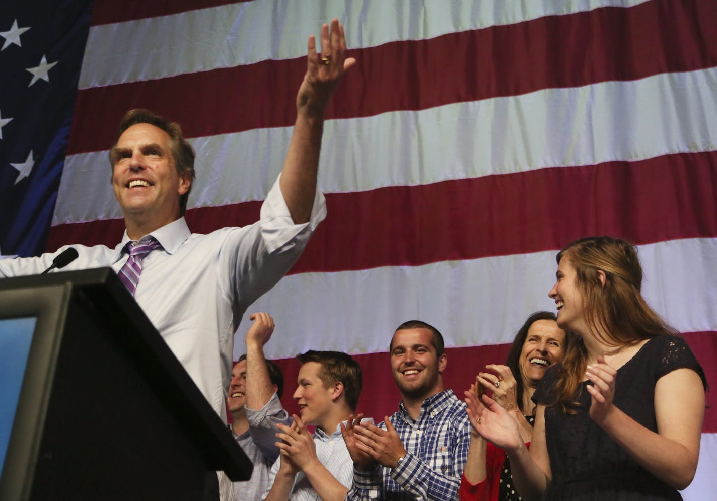 Republican U.S. Senate candidate Mike McFadden stands with his family and addresses delegates after receiving the party's official nomination at the Minnesota Republican Party Convention at the Rochester Civic Center Saturday, May 31, 2014.