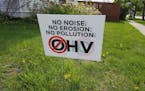 OHV stands for Off-Highway Vehicle and these lawn signs in Houston, Minn., express local opposition to a high-density, motorized vehicle trail project