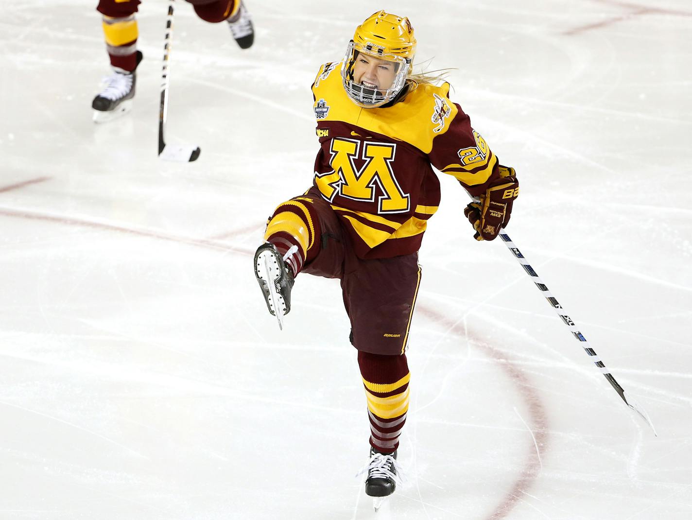 Minnesota's Sarah Potomak celebrates her goal 13 seconds into the game during the first period of the NCAA women's Frozen Four championship college hockey game against Boston College in Durham, N.H. Sunday, March 20, 2016. (AP Photo/Winslow Townson)