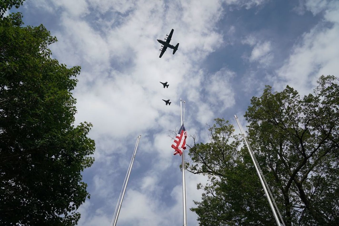 Two F-16 jets from the 148th Fighter Wing in Duluth and a C-130 Hercules with the 133rd Air Wing in St. Paul flew over the Minnesota State Fairgrounds on Military Appreciation day at the conclusion of an official welcome home ceremony for the 34th Red Bull Infantry Division.