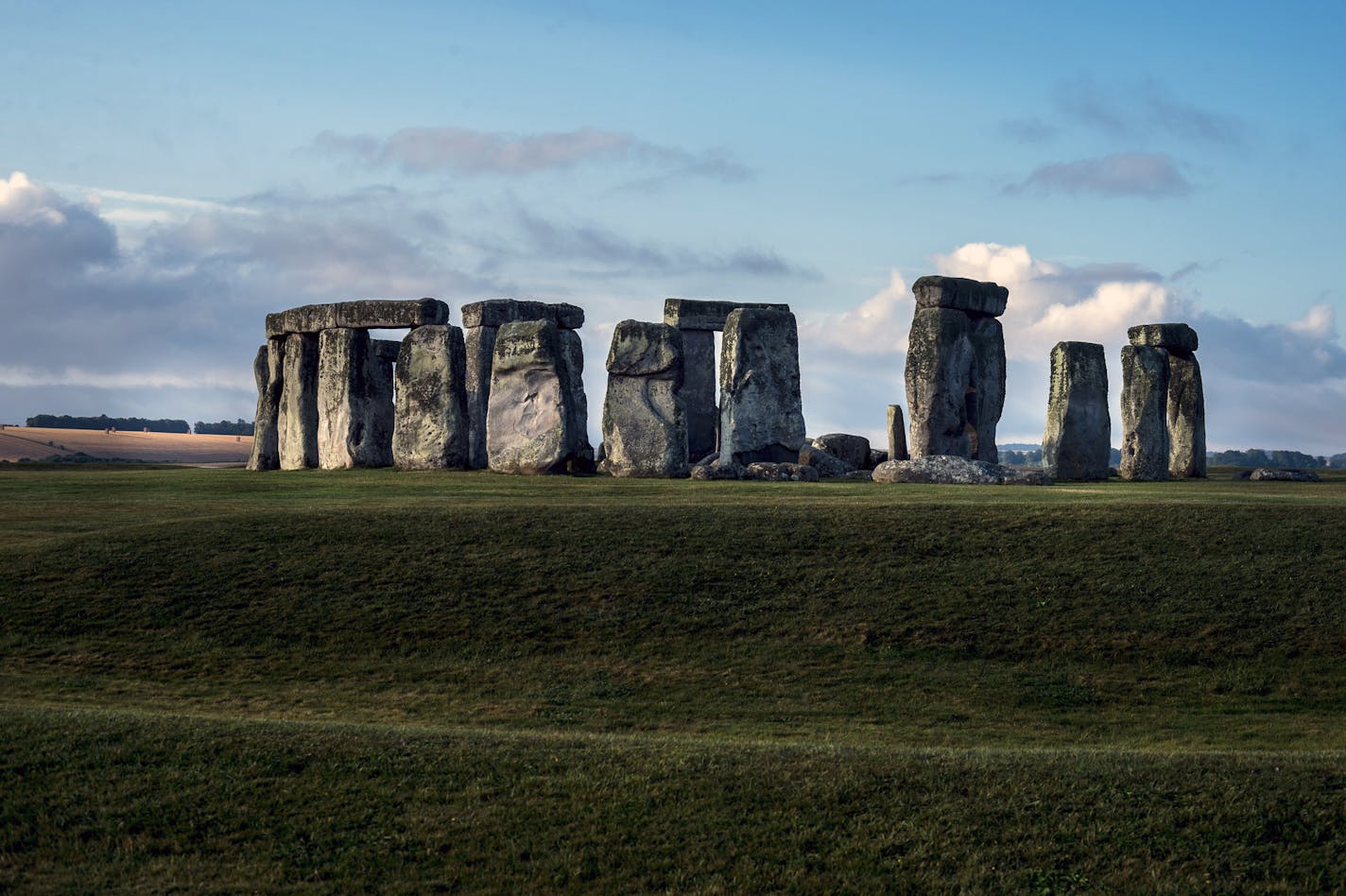 FILE -- Stonehenge, roughly 5,000 years old, on the Salisbury Plain near Amesbury, England, on Aug. 6, 2014. Archaeologists in 2019 pinpointed the provenance of many of the ancient monuments' massive stones. A new study identifies the origin of the rest. (Andrew Testa/The New York Times)