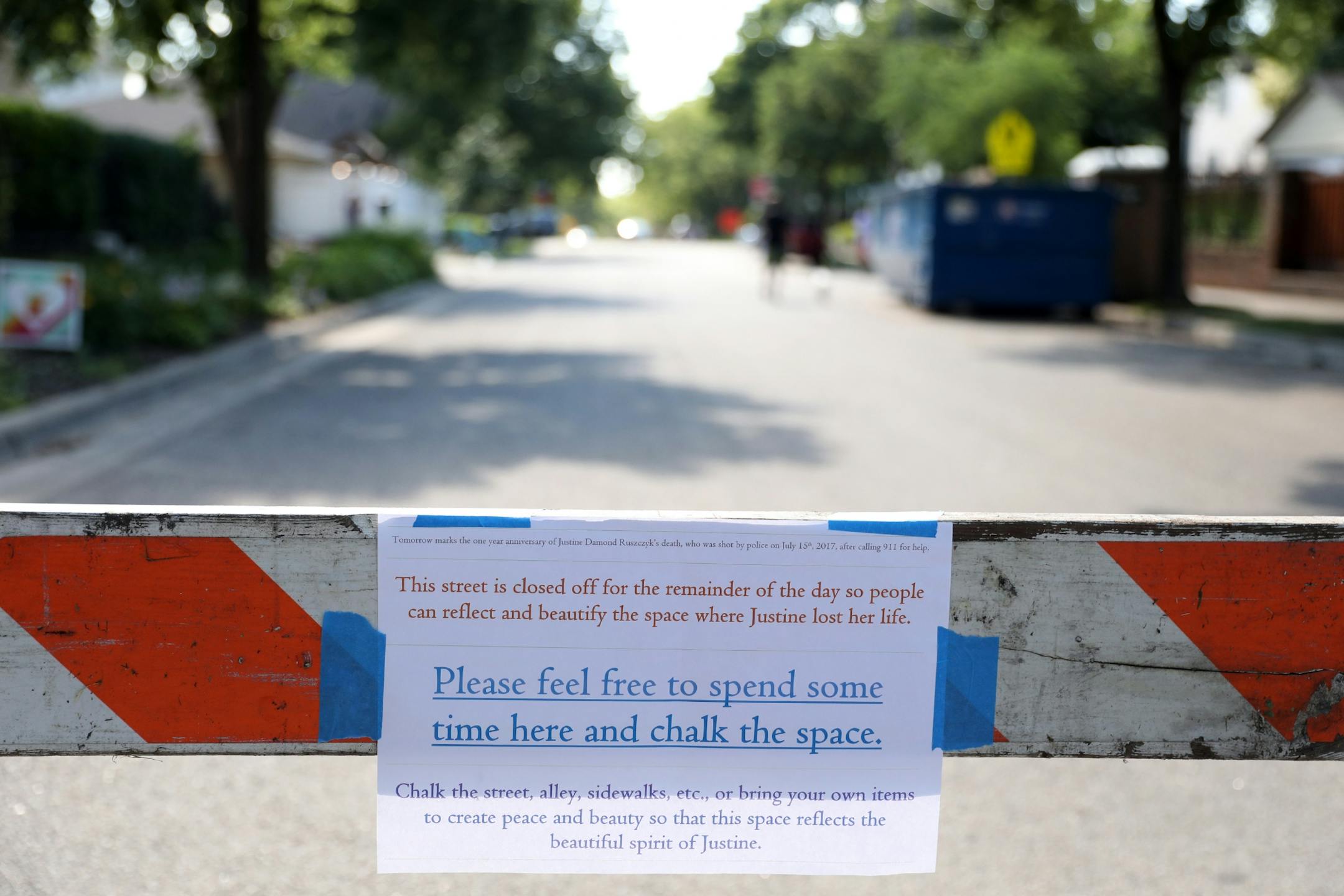 The road to the alley where Justine Ruszczyk Damond was killed was closed off for friends and family to gather on the one year anniversary of her death.