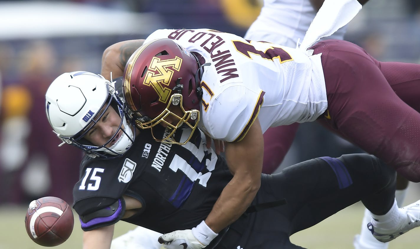 Minnesota Gophers defensive back Antoine Winfield Jr. (11) sacked Northwestern Wildcats quarterback Hunter Johnson (15), forcing a fumble and taking Johnson out of the game with an injury in the second quarter. ] Aaron Lavinsky • aaron.lavinsky@startribune.com The Minnesota Gophers played the Northwestern Wildcats on Saturday, Nov. 23, 2019 at Ryan Field in Evanston, Ill.