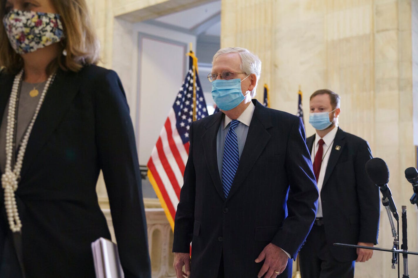 Senate Majority Leader Mitch McConnell, R-Ky., arrives as Senate Republicans hold leadership elections, on Capitol Hill in Washington, Tuesday, Nov. 10, 2020. (AP Photo/J. Scott Applewhite)