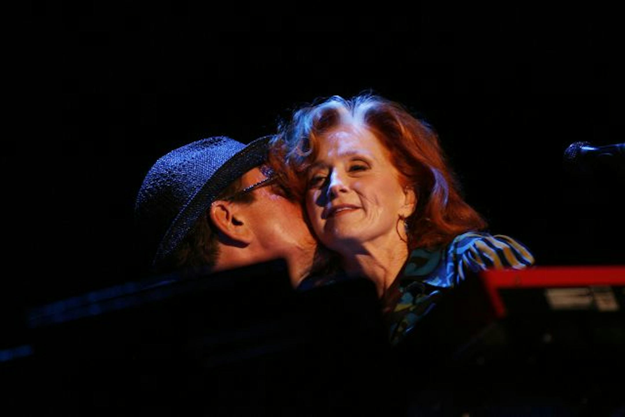 Bonnie Raitt shared a tender moment Thursday with Twin Cities keyboardist Ricky Peterson during an emotional tribute song to her late brother Steve Raitt on the first night of State Fair grandstand shows. Peterson and Steve Raitt were close friends until Steve died of brain cancer this year. For more photos of Bonnie Raitt and her opening act, bluesman Taj Mahal, go to startribune.com/galleries.