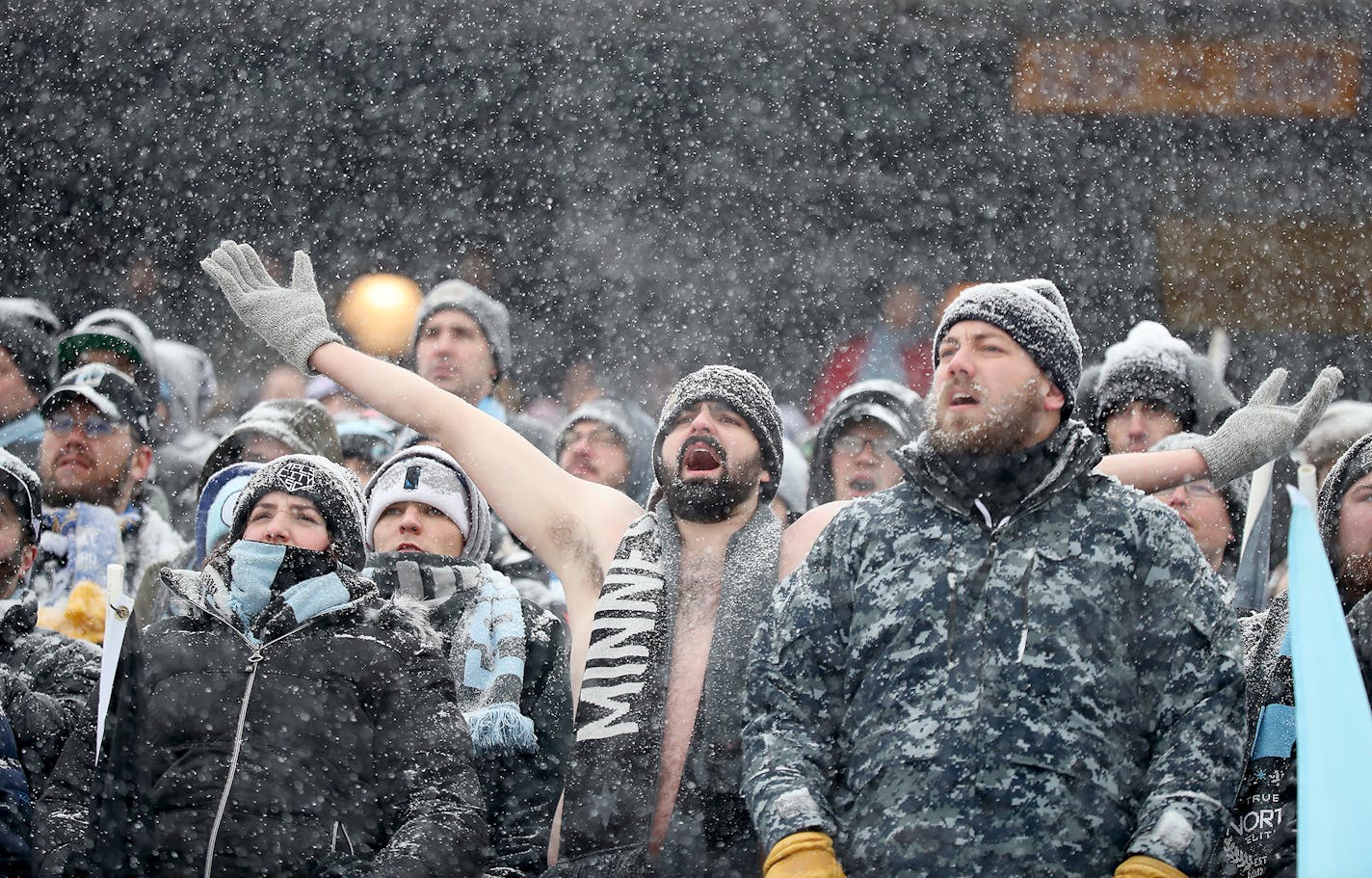 Minnesota United FC fans braved the cold and snow to cheer for the team during the first half as the Minnesota United FC took on Atlanta United at TCF Bank Stadium, Sunday, March 12, 2017 in Minneapolis, MN. ] ELIZABETH FLORES � liz.flores@startribune.com