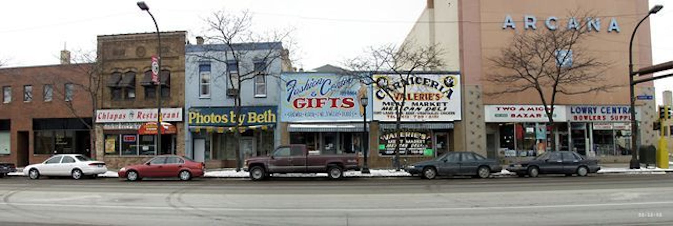 Street scene of shops along Central Avenue north of the intersection at Lowry Avenue in Minneapolis.