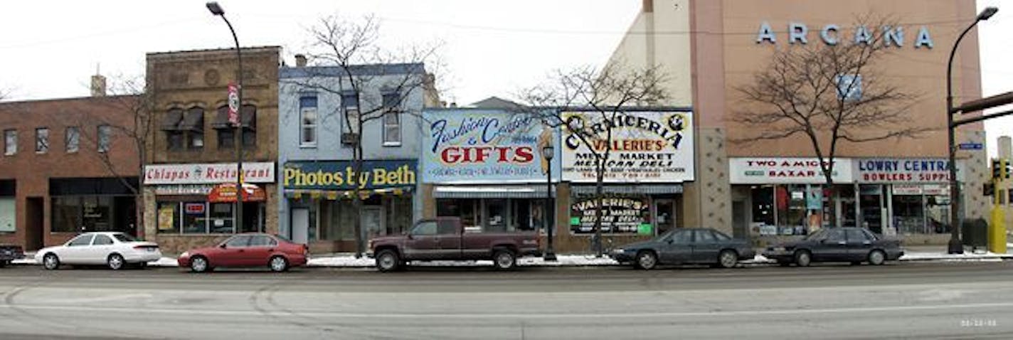 Street scene of shops along Central Avenue north of the intersection at Lowry Avenue in Minneapolis.