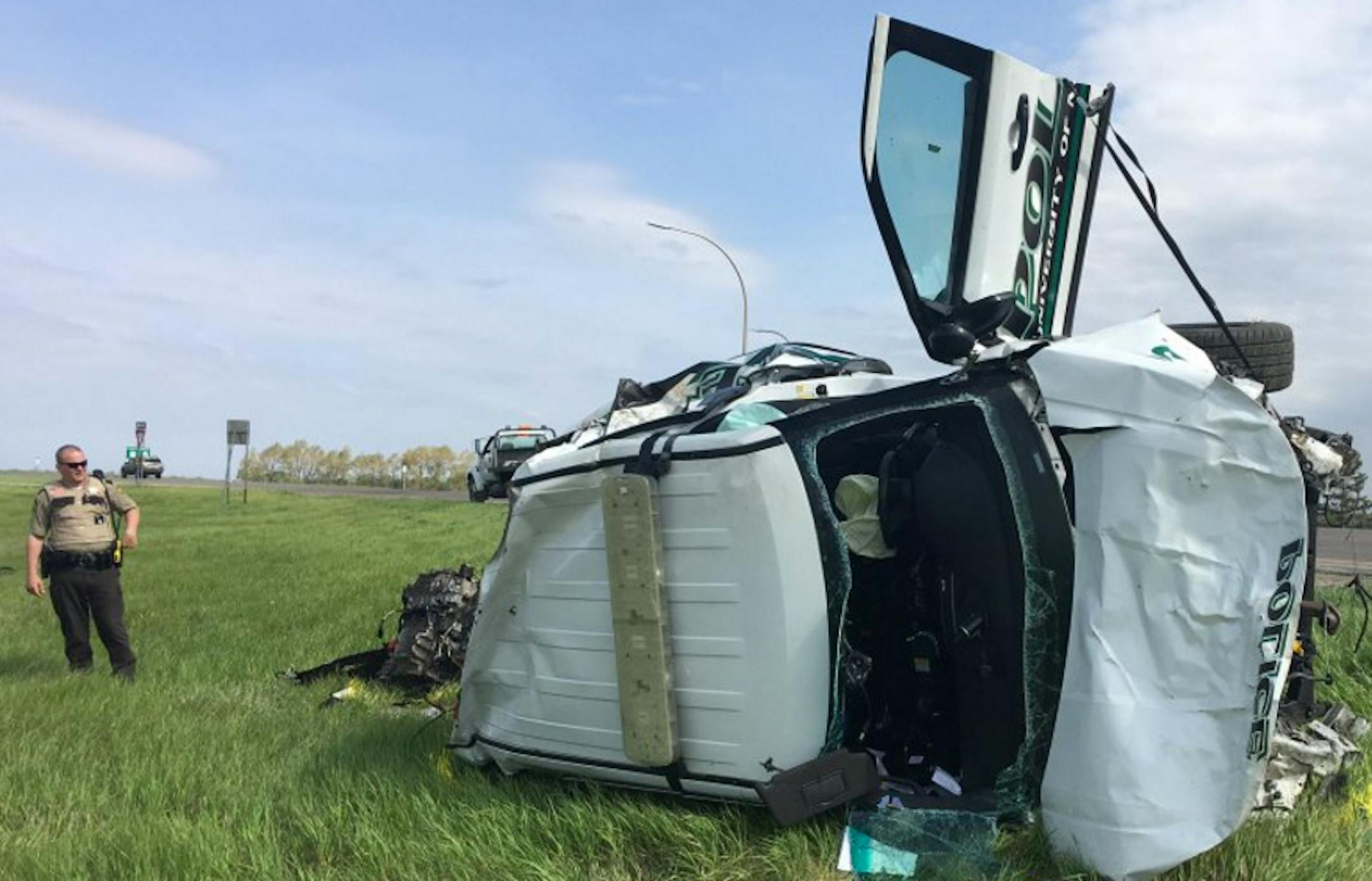 A Minnesota State Patrol trooper sized up what was left of a stolen University of North Dakota police squad vehicle.