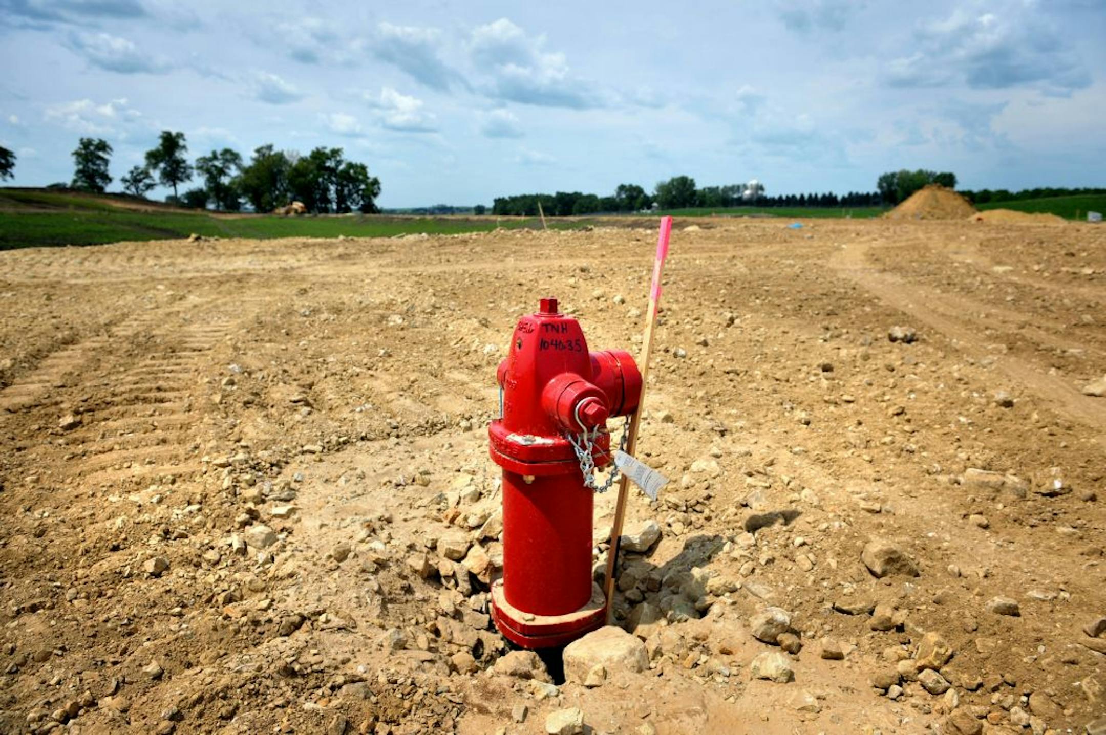 Water and sewer lines are laid under what will become a road through Elk Run, a new BioBusiness Park in Pine Island, just north of Rochester. The development is being done by Tower Investments, a California-based real estate investment company which bought the 2,325-acres which includes an Elk Farm.
