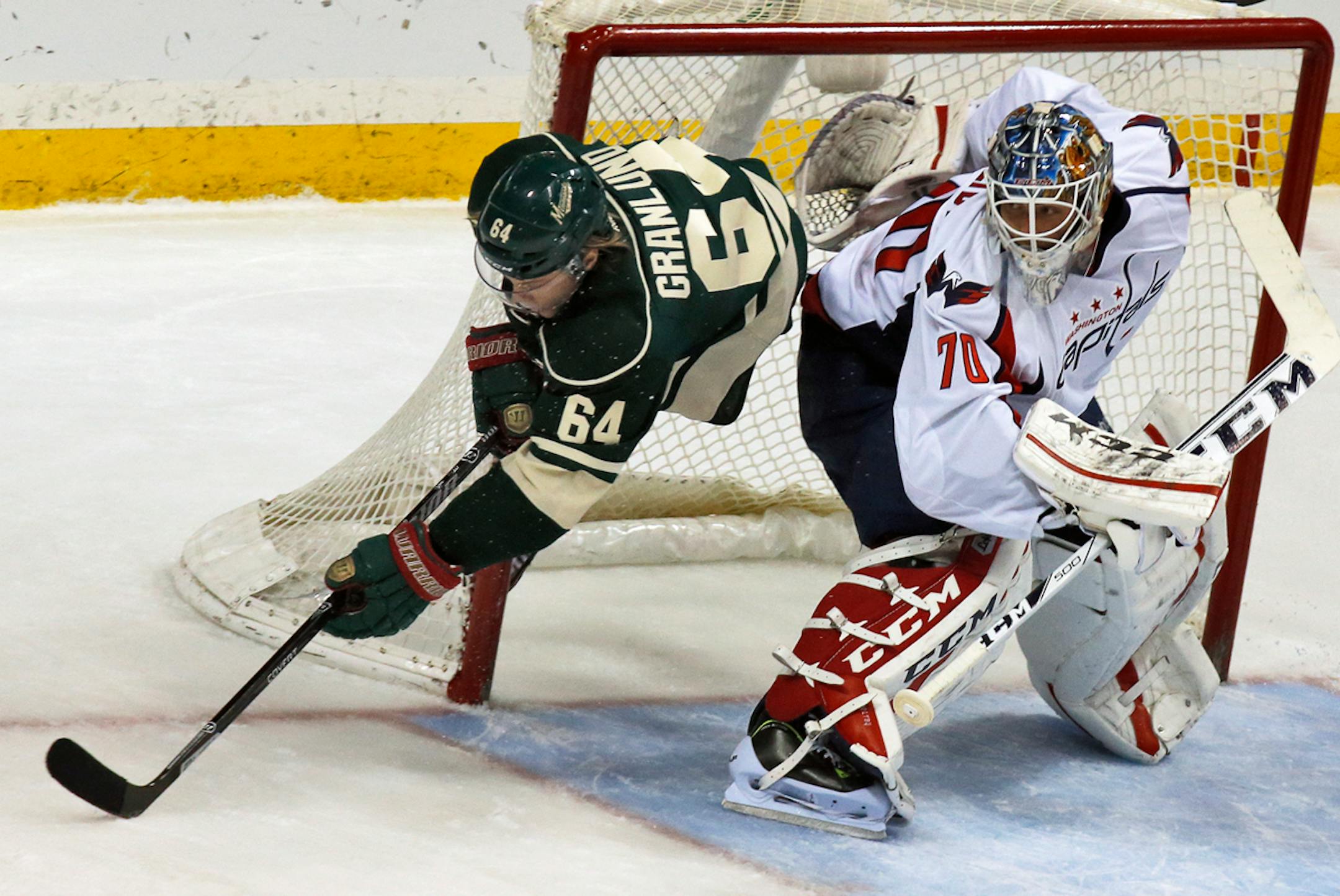 The Wild's Mikael Granlund (64) sailed around Capitals goalie Braden Holtby on Saturday night.