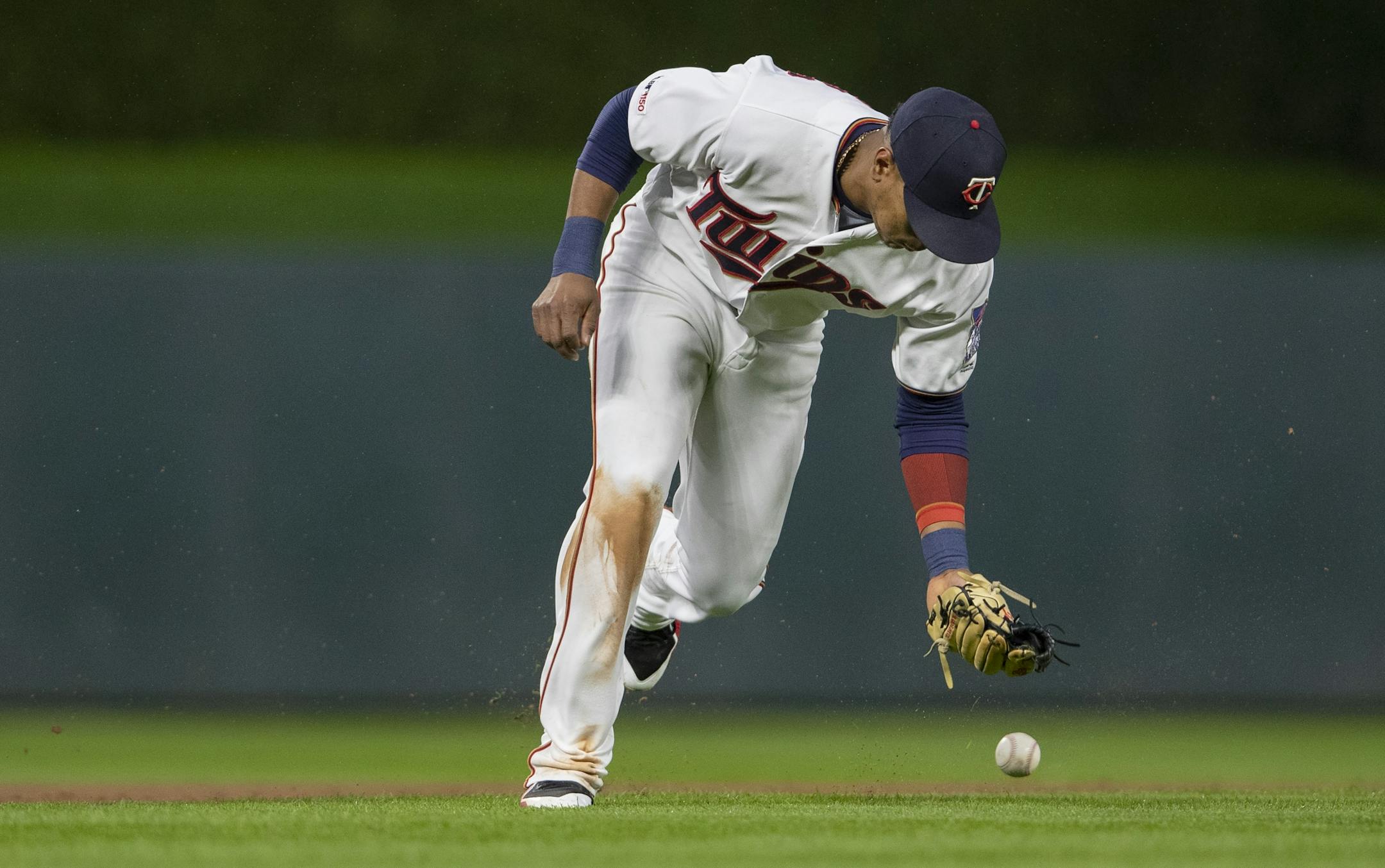 Minnesota Twins shortstop Jorge Polanco had trouble fielding a ball hit by Josh Reddick in the fifth inning.