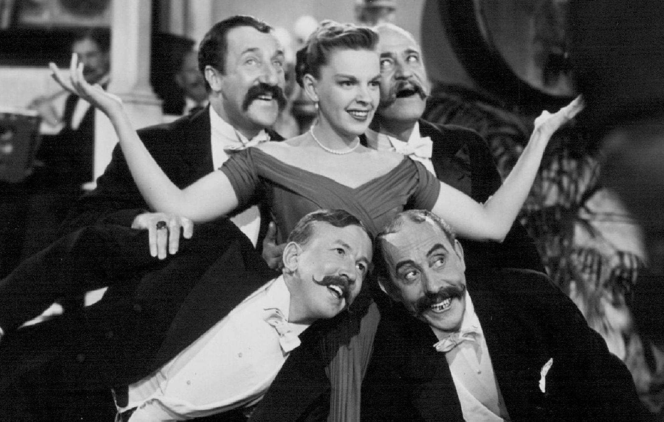 July 1, 1949 The nostalgic quality and appeal of songs of the early 1900's is given full play in Metro-Goldwyn-Myer's charming Technicolor production, "In the Good Old Summertime," co-starring Judy Garland and Van Johnson. High spot among these is "Play That Barber Shop Chord," sung by Judy and a quartette of singing waiters. This, as well as such songs as "Meet Me Tonight in Dreamland," "Put Your Arms Around Me Honey," and "I Don't Care," are slated for new popularity following the release of t