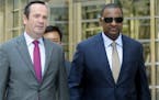 Former FIFA vice president Jeffrey Webb, right, leaves Brooklyn federal court with his attorney Edward O'Callaghan, Friday, Aug. 14, 2015, in New York