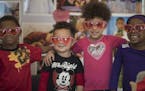 Malik Staples left , Carieon Curry-Lerma, Mya Hairston and Malaya Perry tried on heart shaped sunglass at the early childhood services center at Phyll