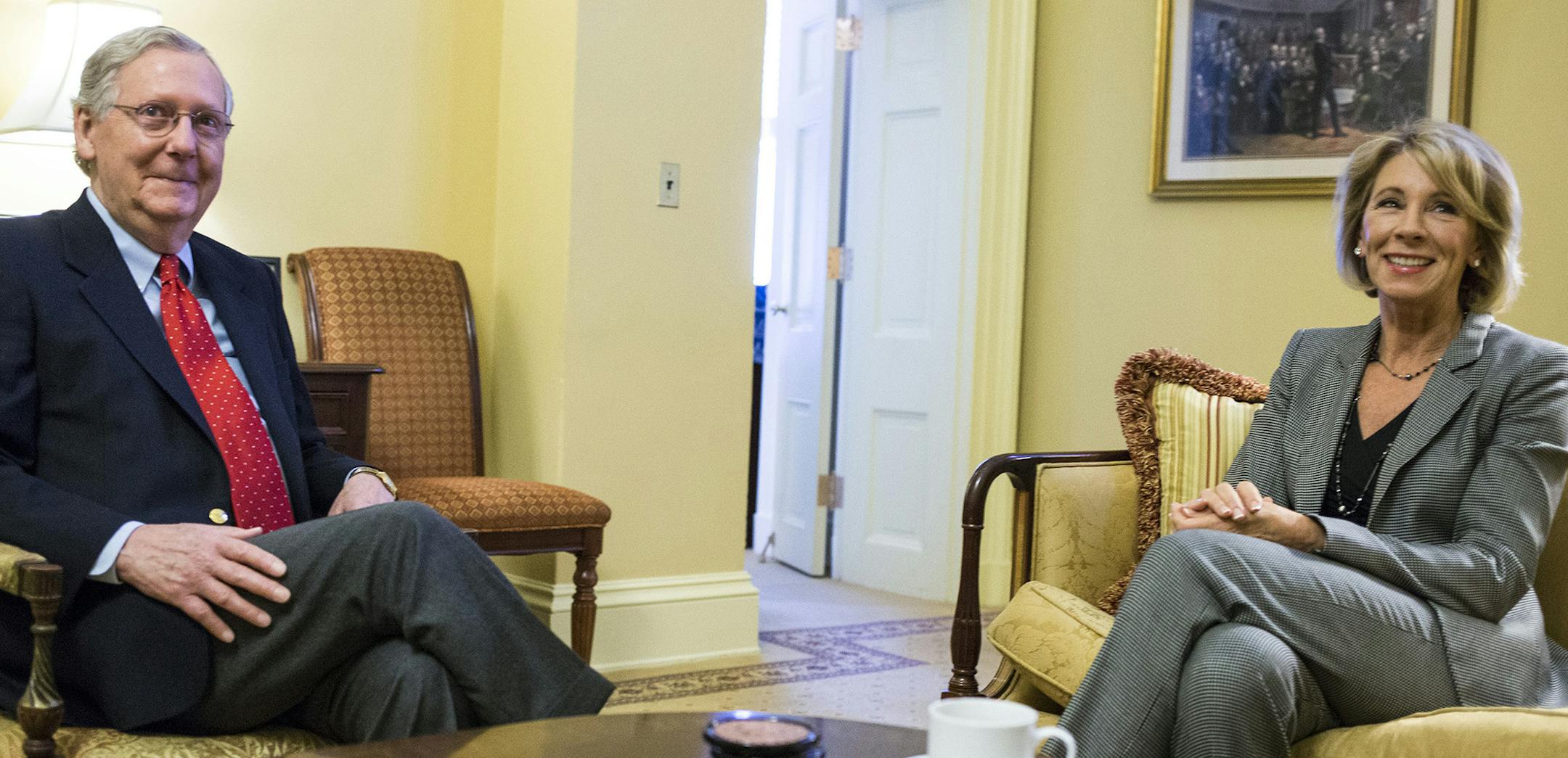 FILE -- Senate Majority Leader Mitch McConnell (R-Ky.) meets with Betsy DeVos, Donald Trumpís pick for education secretary, in Washington, Dec. 1, 2016. Senate Democrats say they are prepared to use the confirmation of Donald Trumpís cabinet nominees to highlight inconsistencies from his campaign. (Al Drago/The New York Times) ORG XMIT: MIN2017011013193916