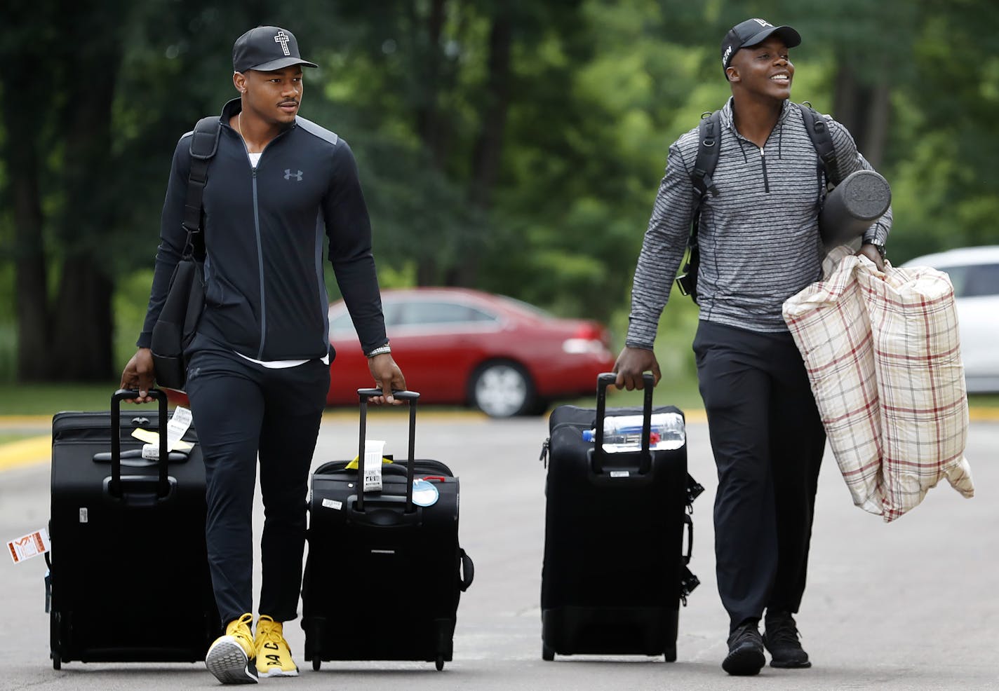 Stefon Diggs and Teddy Bridgewater walked up the dorms after arriving in Mankato for training camp. ] CARLOS GONZALEZ cgonzalez@startribune.com - July 28, 2016, Mankato, MN, Minnesota State University, Mankato, Minnesota Vikings Training Camp