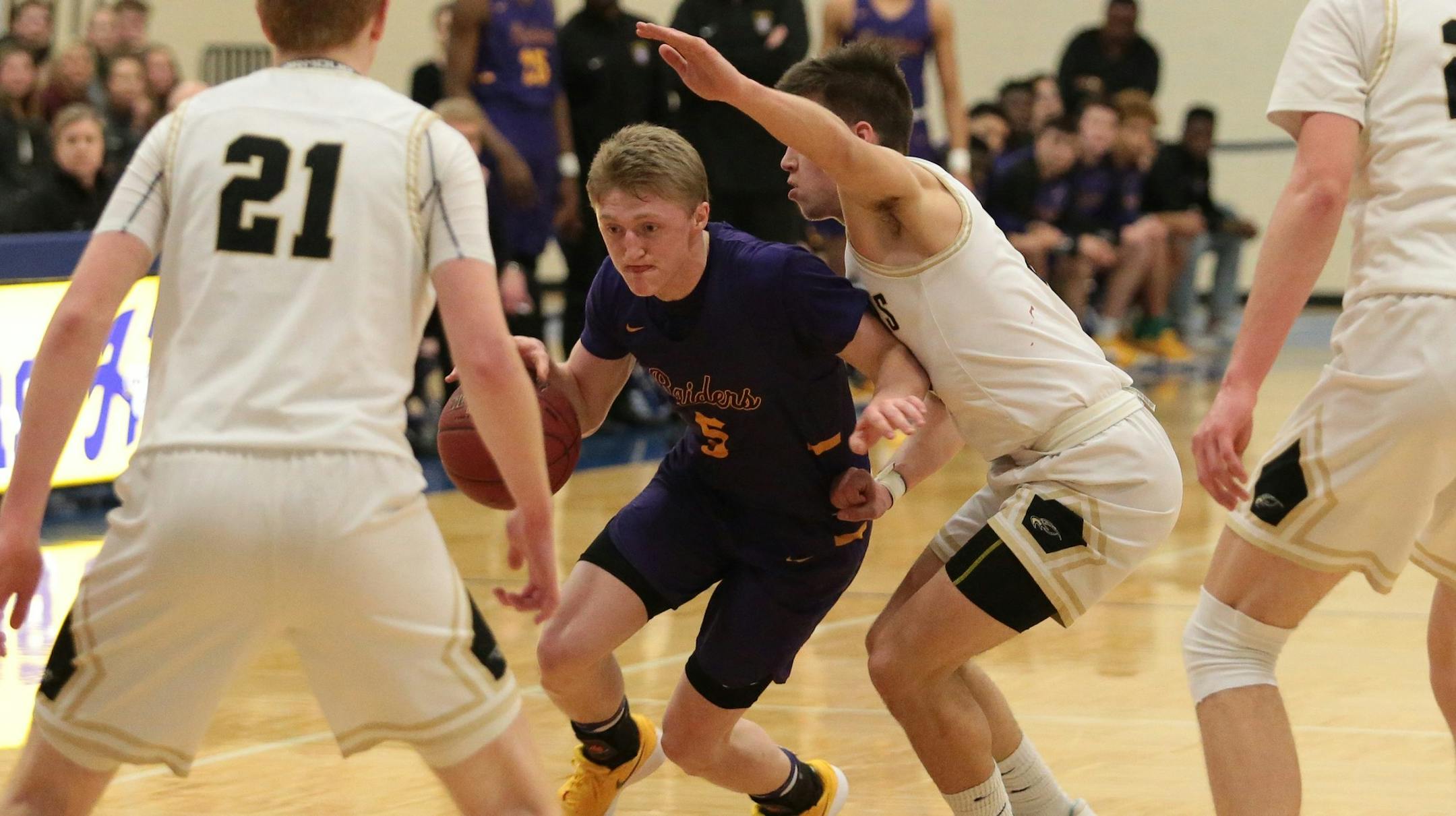 Cretin-Derham Hall's Ryan Larson (5), Class 4A section final against East Ridge on March 15.