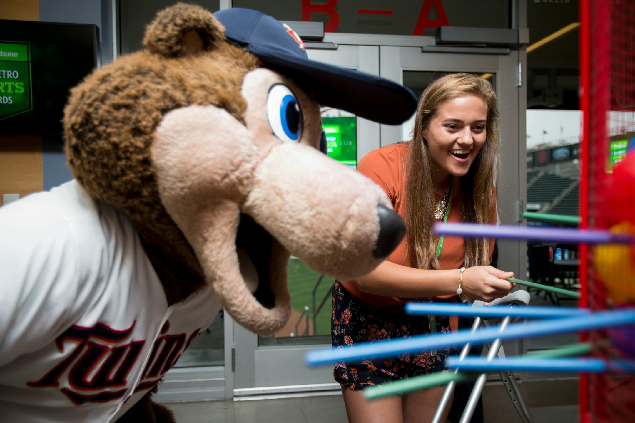 Cassidy Lehrke played giant Kerplunk with her family and Twins mascot TC Bear at the Awards gala on Tuesday.