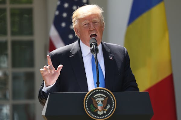 President Donald Trump speaks during a news conference with Romanian President Klaus Werner Iohannis, in the Rose Garden at the White House, Friday, J