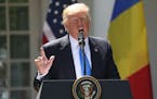 President Donald Trump speaks during a news conference with Romanian President Klaus Werner Iohannis, in the Rose Garden at the White House, Friday, J