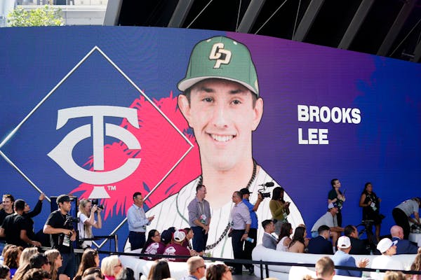 Brooks Lee is selected by the Minnesota Twins with the eighth pick of the 2022 MLB baseball draft, Sunday, July 17, 2022, in Los Angeles. (AP Photo/Ja