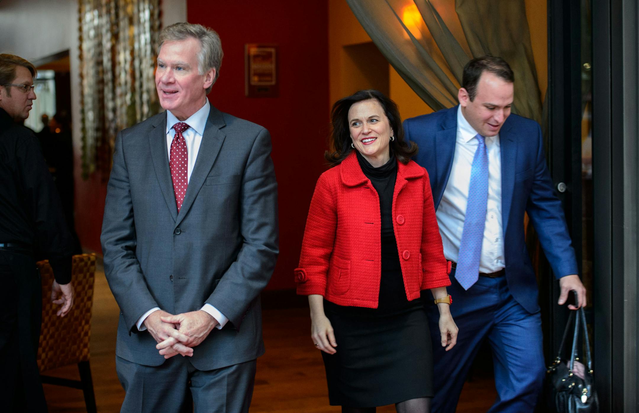 Mayor Chris Coleman and Mayor-Elect Betsy Hodges emerged from lunch at Mission American Kitchen in Minneapolis. On the right is Coleman's Communications Director Joe Campbell. Coleman later presented Hodges with a framed print of the 612 and 651 area codes of the Twin Cities and the two said they talked about ways for cooperation between the cities. Thursday, November 7, 2013. ] GLEN STUBBE * gstubbe@startribune.com Mayor Chris Coleman and Mayor-Elect Betsy Hodges emerged from lunch at Mission A