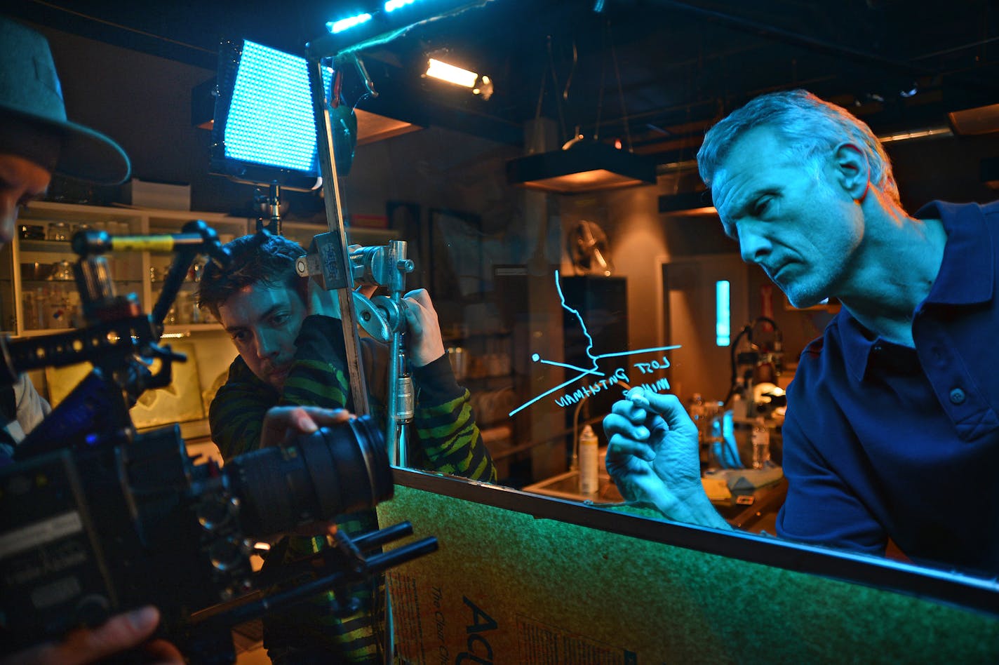 Scott Wolter drew on a piece of glass working on a graphic during a on camera shot for "America Unearthed." ] Scott Wolter, a Chanhassen resident is the host of a successful program on History Channel 2 titled, "America Unearthed." It is produced by the Chaska-based film company, Committee Films Richard.Sennott@startribune.com Richard Sennott/Star Tribune Chaska , Minn. Wednesday 3/12/2014) ** (cq)