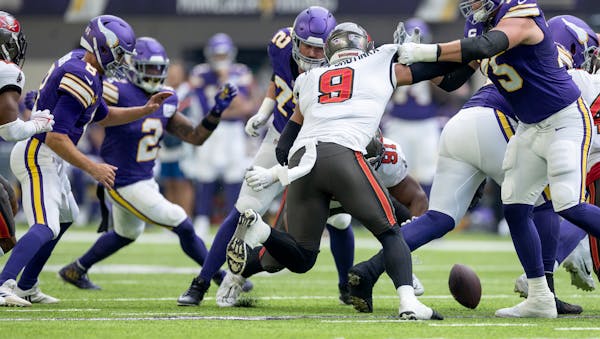 Minnesota Vikings quarterback Kirk Cousins (8) fumbles the ball in the first quarter Sunday, September 10, 2023, U.S. Bank Stadium in Minneapolis, Min