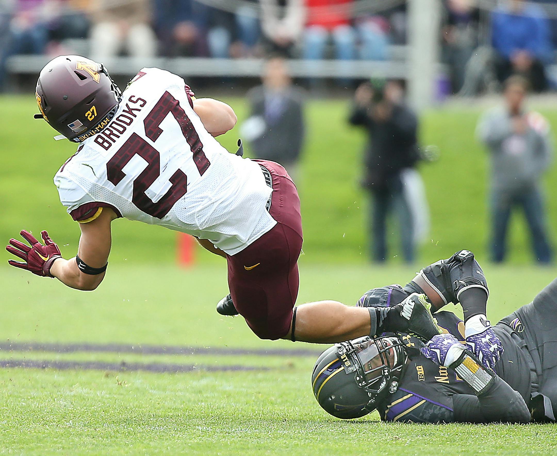 Minnesota's Shannon Brooks was stopped by Northwestern's linebacker Drew Smith in the first quarter as Minnesota took on the Northwestern Wildcats at Ryan Field, Saturday, October 3, 2015 in Evanston, IL. ] (ELIZABETH FLORES/STAR TRIBUNE) ELIZABETH FLORES • eflores@startribune.com