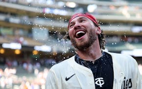 Twins outfielder DaShawn Keirsey Jr. reacts after being doused for his walk-off single that beat the Giants in 10 innings Sunday at Target Field.
