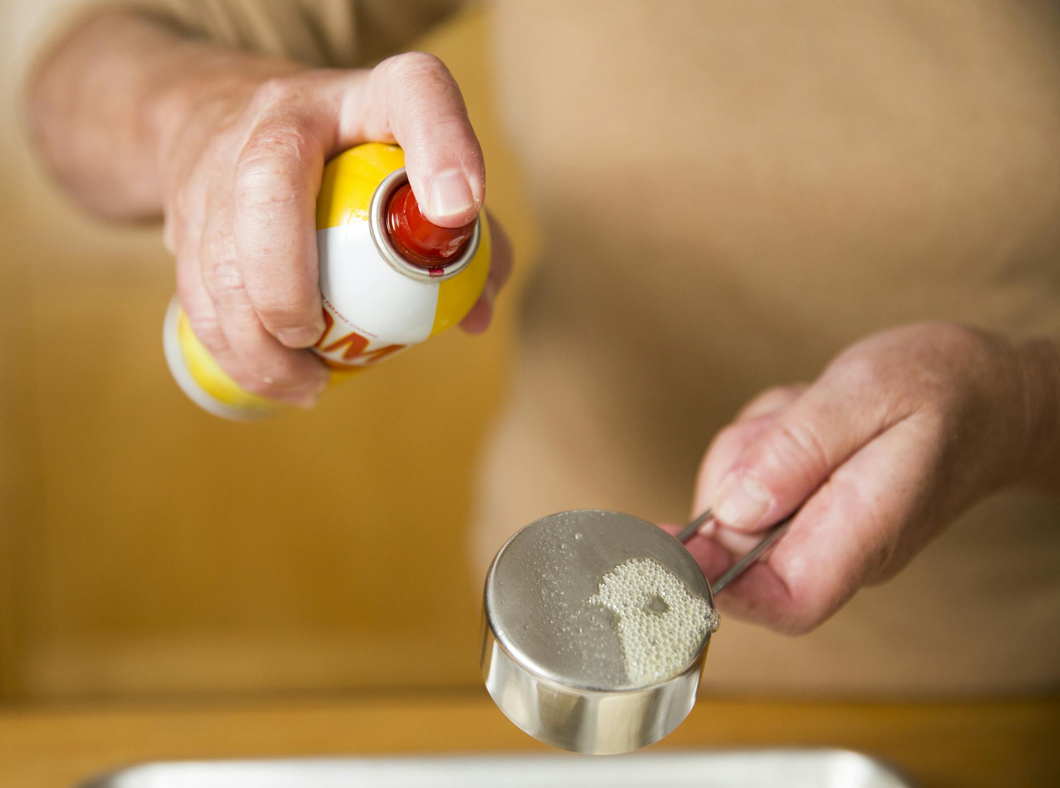 Spray a measuring cup with oil before using flour. ] (Leila Navidi/Star Tribune) leila.navidi@startribune.com BACKGROUND INFORMATION: Baking Central makes bialys, an onion and poppyseed filled bread of Eastern European fame, on Thursday, September 15, 2016.