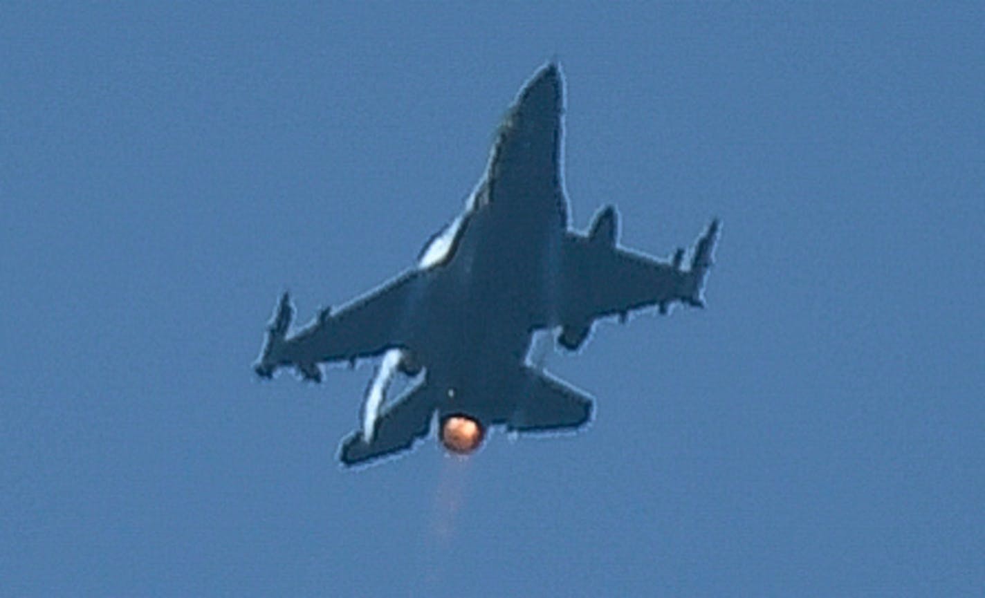 One of two F-16 jets with the 148th Fighter Wing in Duluth practiced a flyover over downtown Minneapolis just before 3 p.m. Wednesday.