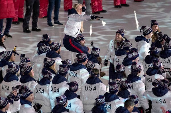 Lindsey Vonn was carried as team USA entered Pyeongchang Olympic Stadium during Closing Ceremony on Sunday.