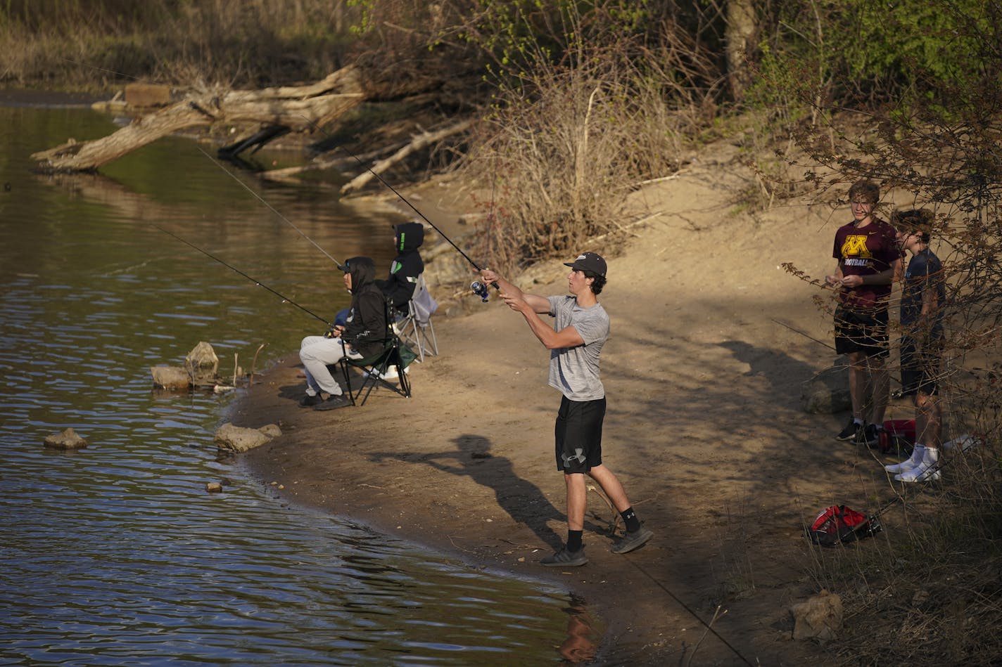 Josh Peroz, 17, cast into the Mississippi River below the Coon Rapids Dam Wednesday evening while fishing with two buddies. ] JEFF WHEELER &#x2022; Jeff.Wheeler@startribune.com Fishing license sales are exploding one week before the fishing opener, we interview a few kids License sales to the 16- to 17-year-old group has more than doubled from a year ago, up 105 percent year. Teens were photographed fishing at the Rum River Dam in Anoka and at Coon Rapids Dam Regional Park in Coon Rapids Wednesd