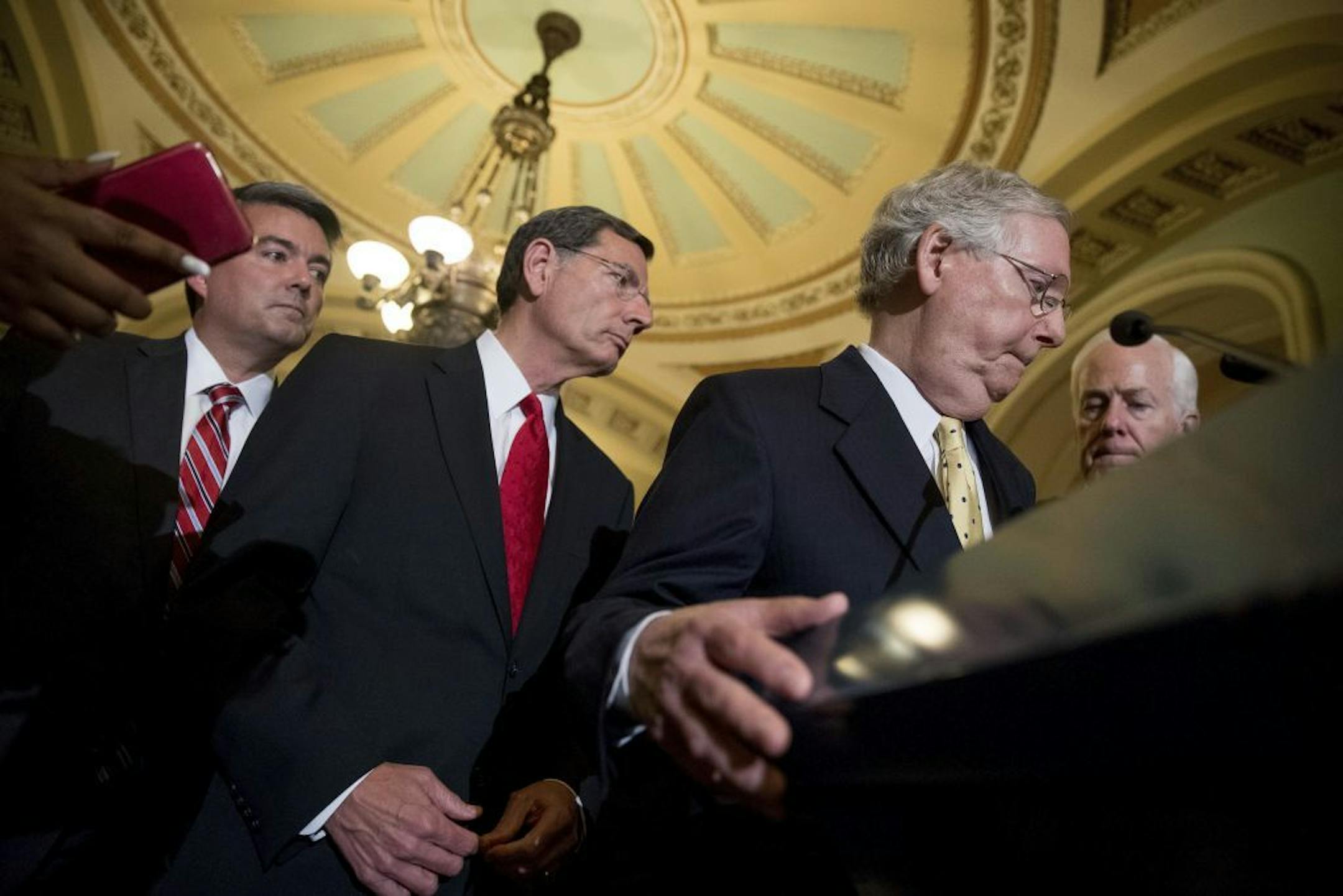 From left, Sen. Cory Gardner, R-Colo., Sen. John Barrasso, R-Wyo., Senate Majority Leader Mitch McConnell of Ky., and Senate Majority Whip Sen. John Cornyn of Texas, participate in a news conference on Capitol Hill in Washington, Tuesday, July 18, 2017. President Donald Trump blasted congressional Democrats and "a few Republicans" over the collapse of the GOP effort to rewrite the Obama health care law.