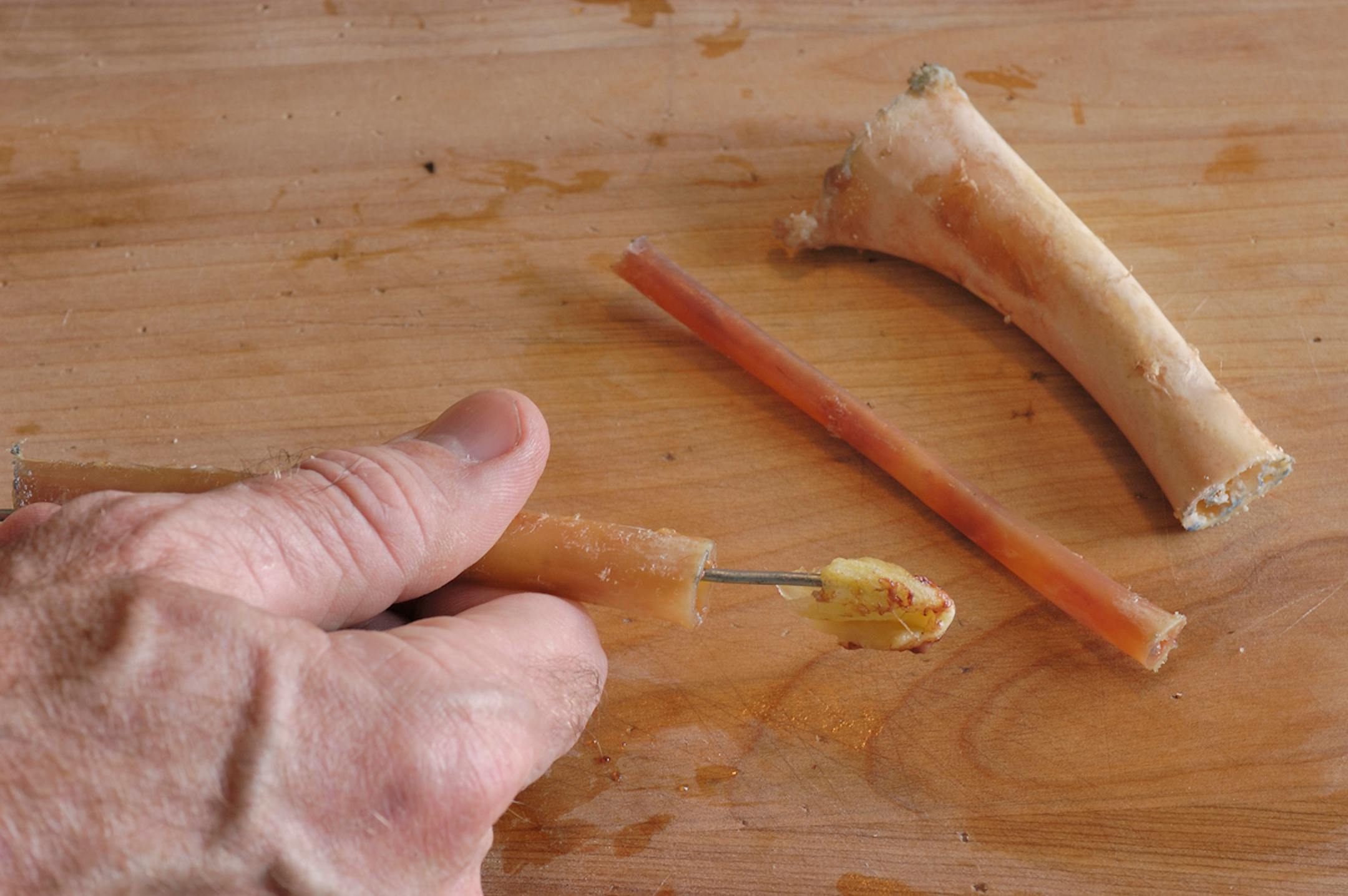 Clean the marrow from the bones using a length of wire and a wad of paper towel or cotton.