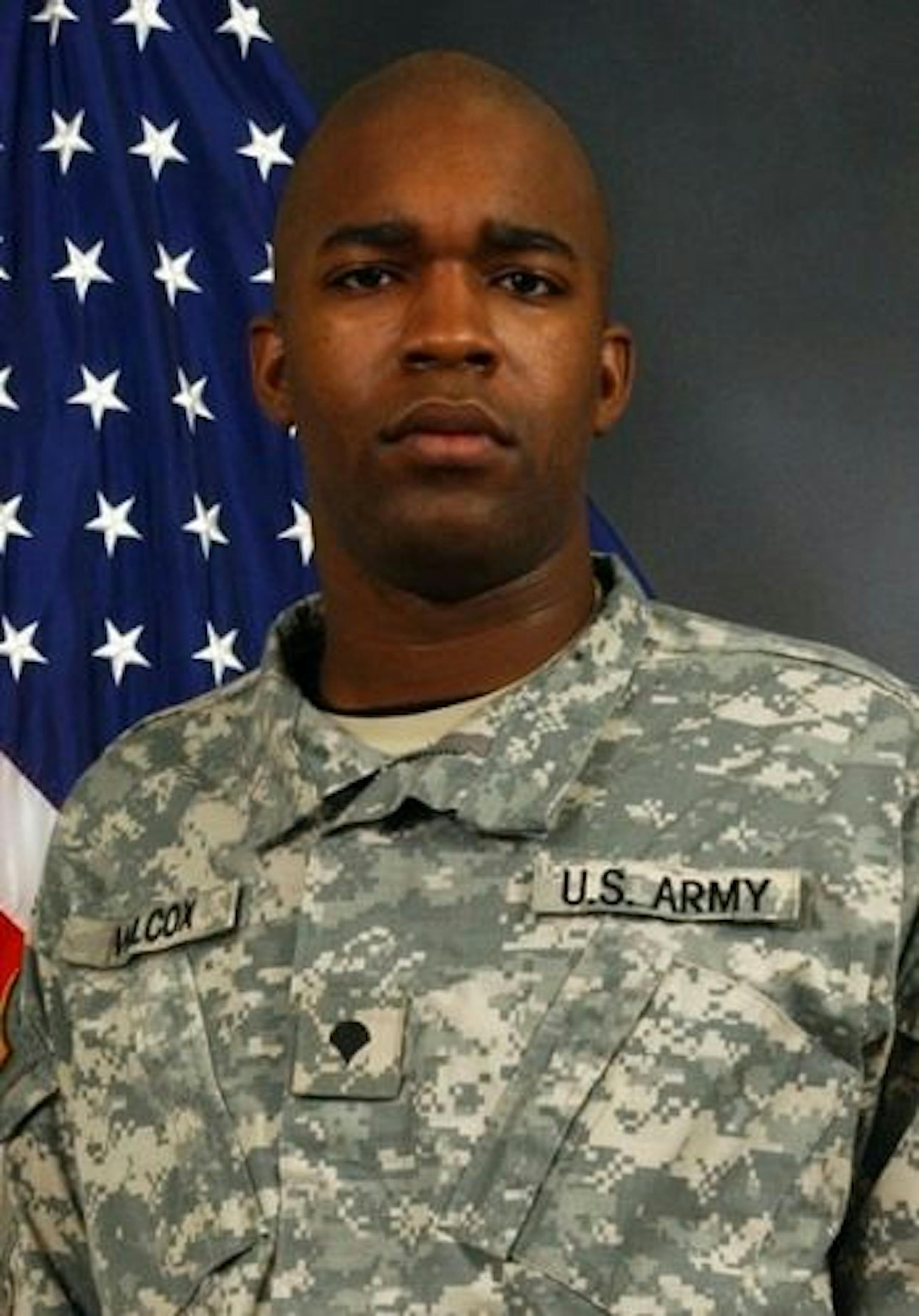 In this undated photo released the Minnesota Army National Guard, Spc. Carlos E. Wilcox IV is shown. Wilcox, 27, was one of three soldiers killed Thursday, July 16, 2009, while on duty in Iraq. All three soldiers were assigned to the 34th Military Police Company, 34th Infantry Division, Minnesota Army National Guard based in Stillwater, Minn.