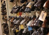 Part of the firearms reference collection where guns used in the commission of a crime in solved cases are stored and seen Tuesday, Nov. 5, 2019, at t