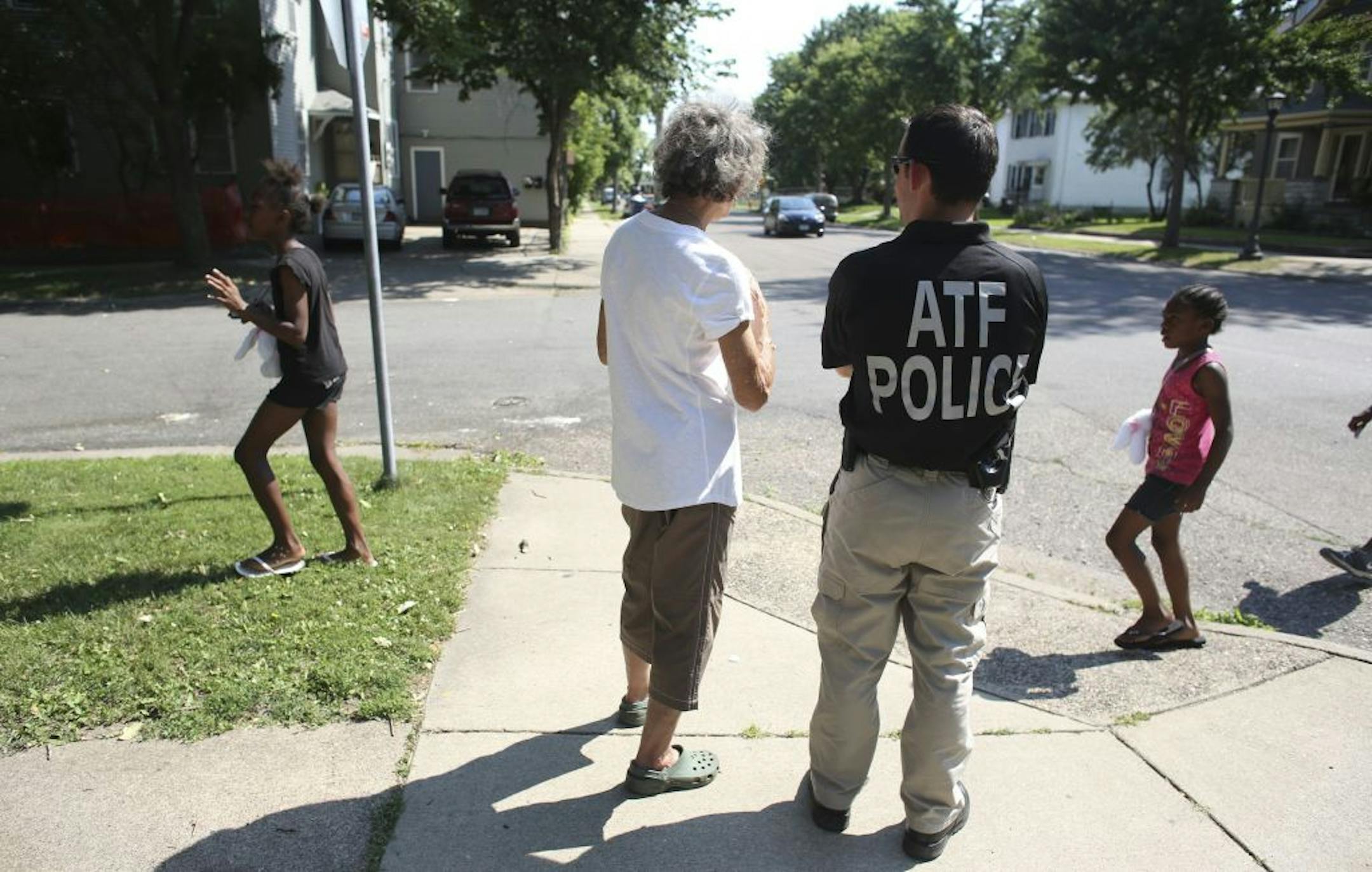 Shirley Thompson talked Thursday with an agent from the Bureau of Alcohol, Tobacco, Firearms and Explosives about crime in the Payne-Phalen neighborhood.