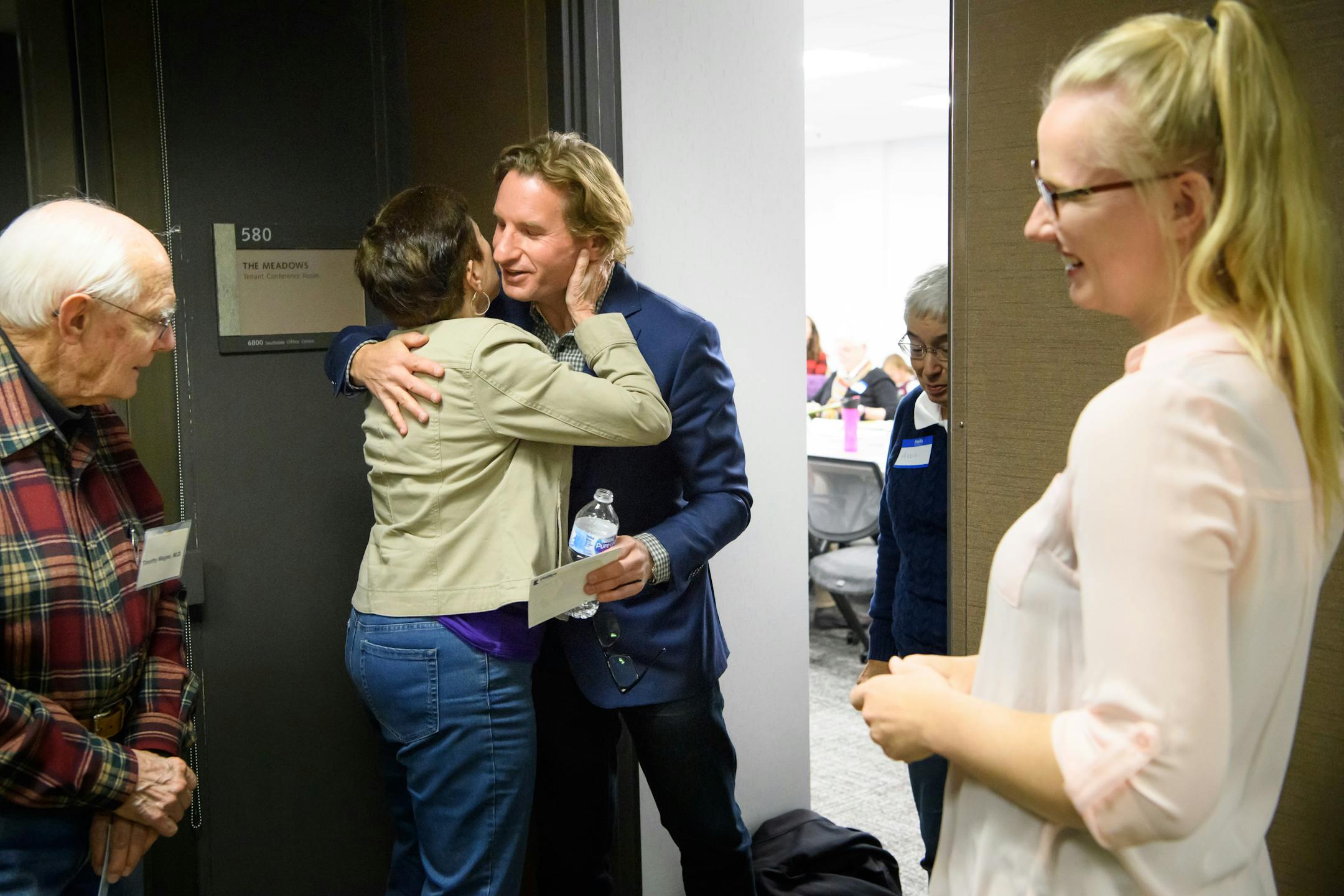 Dean Phillips' outreach director Clara Severson, right, accompanied him as he spoke to an Indivisible group in Edina. Dean Philips, got a hug from a supporter after speaking to the group. Phillips is a DFL hopeful to challenge Rep. Erik Paulsen in the third district. ] GLEN STUBBE � glen.stubbe@startribune.com Wednesday, October 25, 2017 Nearly a year after the presidential election, we check in on the wave of "resistance" that sprung up in the months that followed. Across the state, groups like